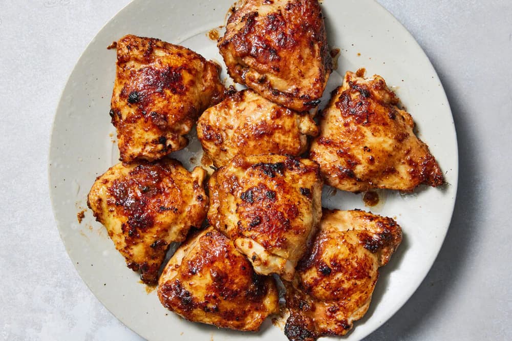 Plate of roasted tahini-miso chicken thighs